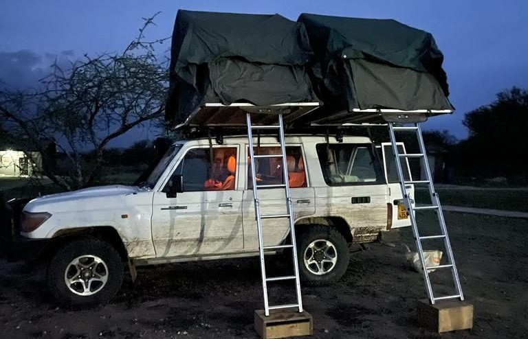 Toyota LX with Family Rooftop Tent